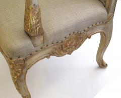 Well Carved French Regence Style Ivory Painted and Parcel gilt Open Arm Chair - 1089424