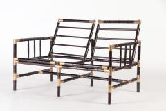 William Billy Haines A brass mounted faux bamboo adjustable settee In the manner of Billy Haines - 2203029