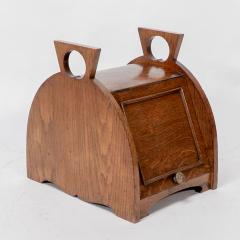 William James Neatby W J Neatby attri An Arts Crafts oak coal box with stylized carrying handles - 4188779