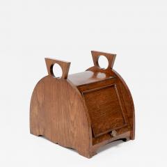 William James Neatby W J Neatby attri An Arts Crafts oak coal box with stylized carrying handles - 4234554