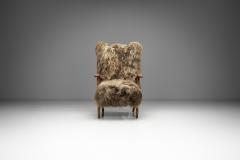 Wingback Armchair in Brown Longhair Sheepskin Denmark 1960s - 4303566