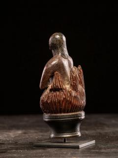 Wooden folk art figure depicting a stylized feminine soul burning in Purgatory - 4755608