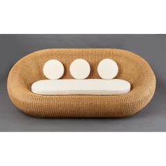 Woven Rattan Oval Shaped Couch 1970s - 1306696