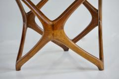 pierluigi Giordani Pierluigi Giordani round coffee table carved wood and crystal top 1950 - 3726887