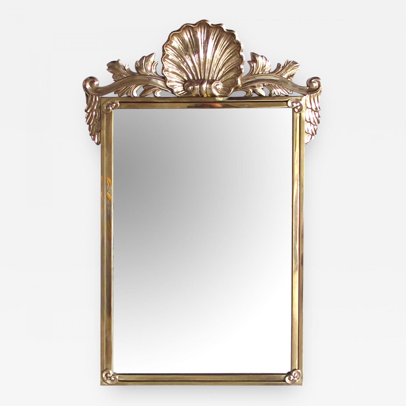A good quality Italian Hollywood regency brass mirror by Decorative