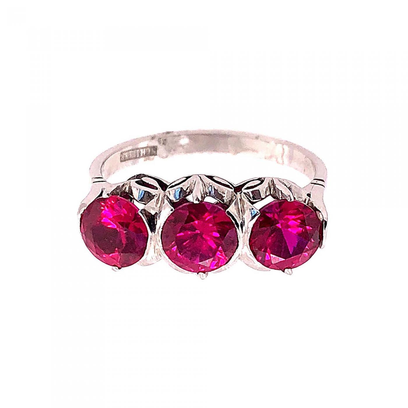 three stone ruby ring