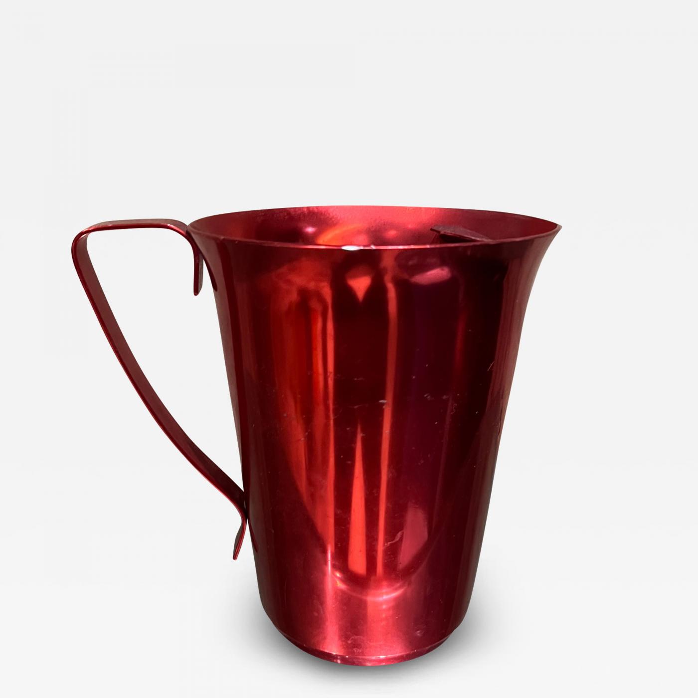 https://cdn.incollect.com/sites/default/files/zoom/1970s-Modernist-Red-Aluminum-Pitcher-689658-3403967.jpg