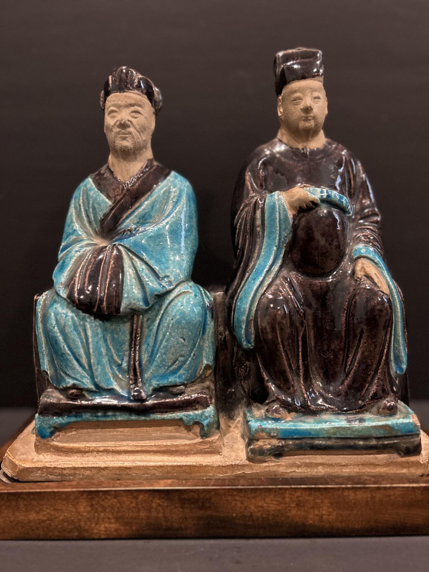 A Fahua-glazed official group, Ming Dynasty