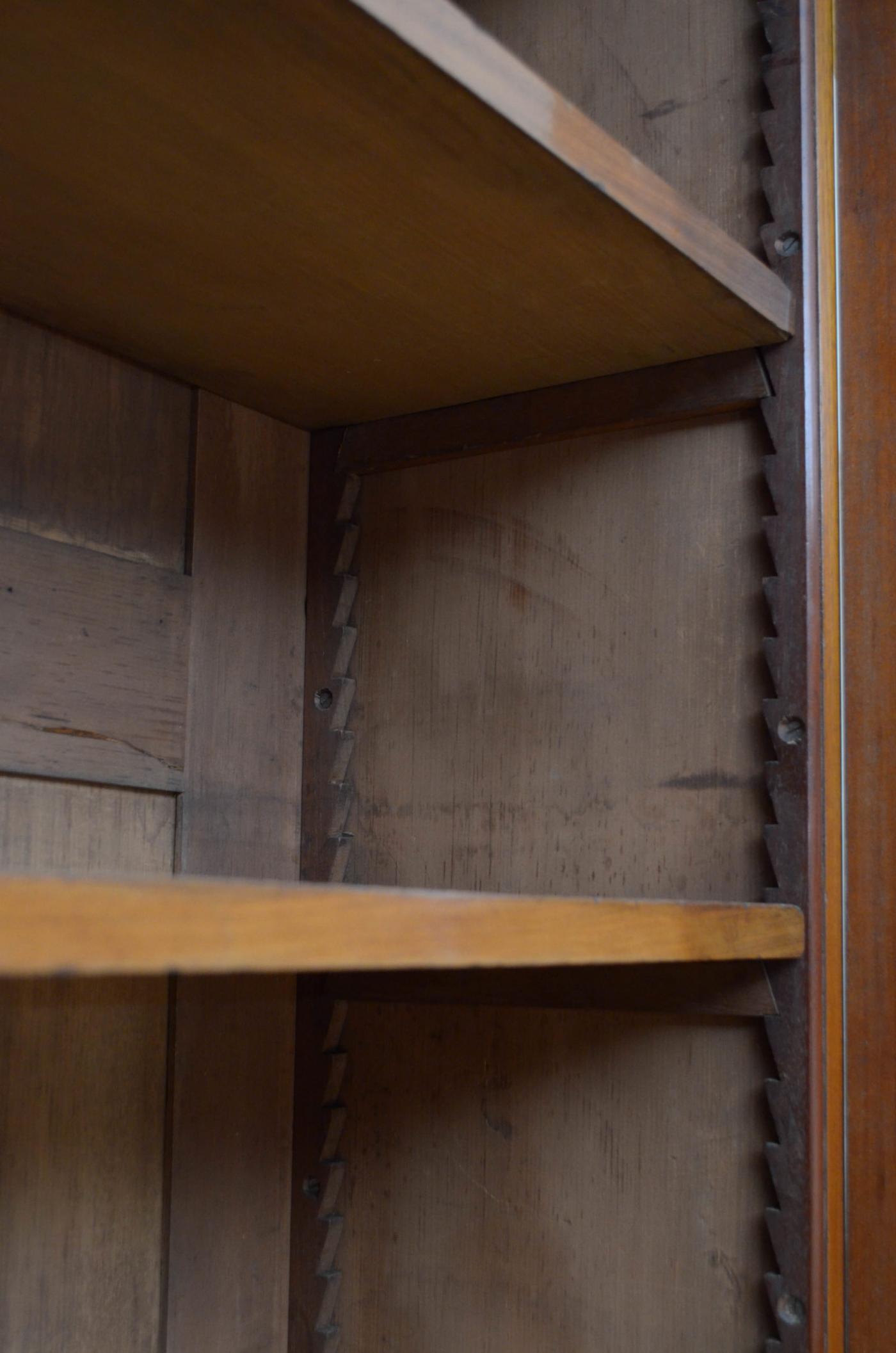 A LARGE VICTORIAN WALNUT LIBRARY BOOKCASE