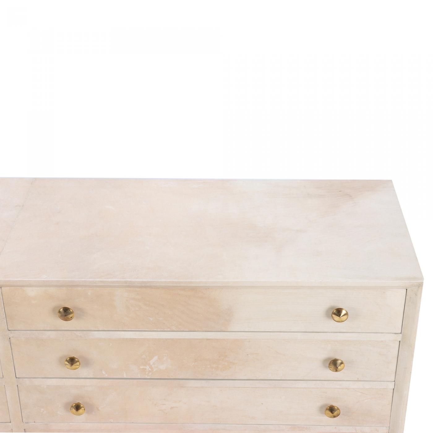 A Mid century Modern parchment covered dresser. Circa 1960.