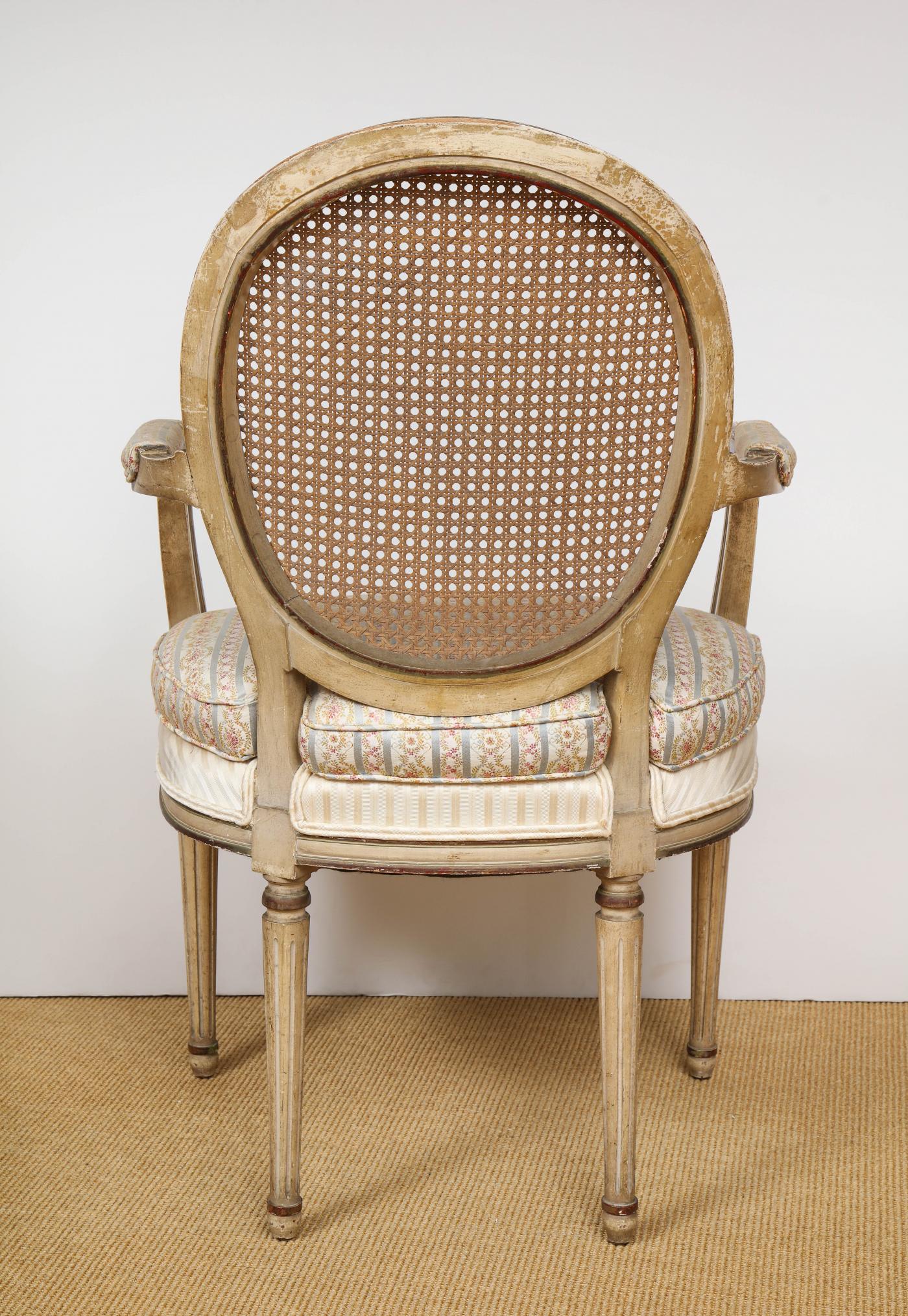 A Pair of Louis XVI Arm Chairs