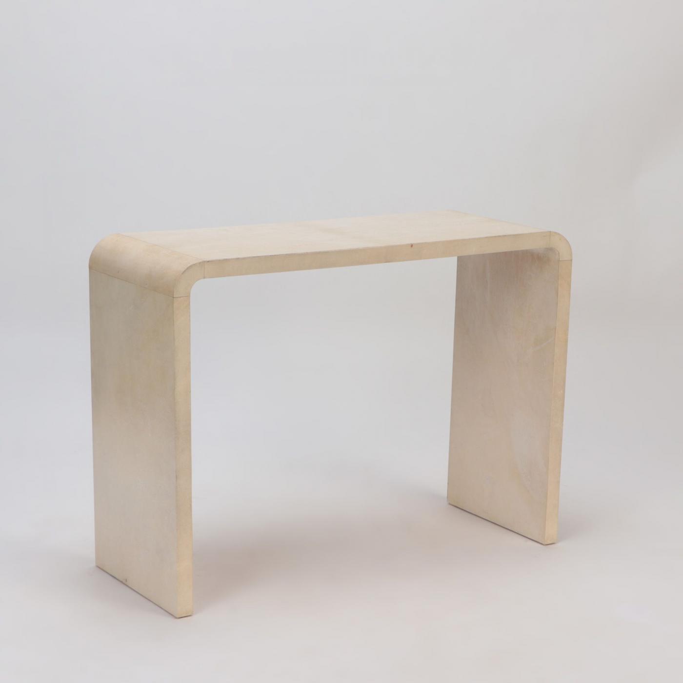 A pair of parchment covered console tables. Contemporary.