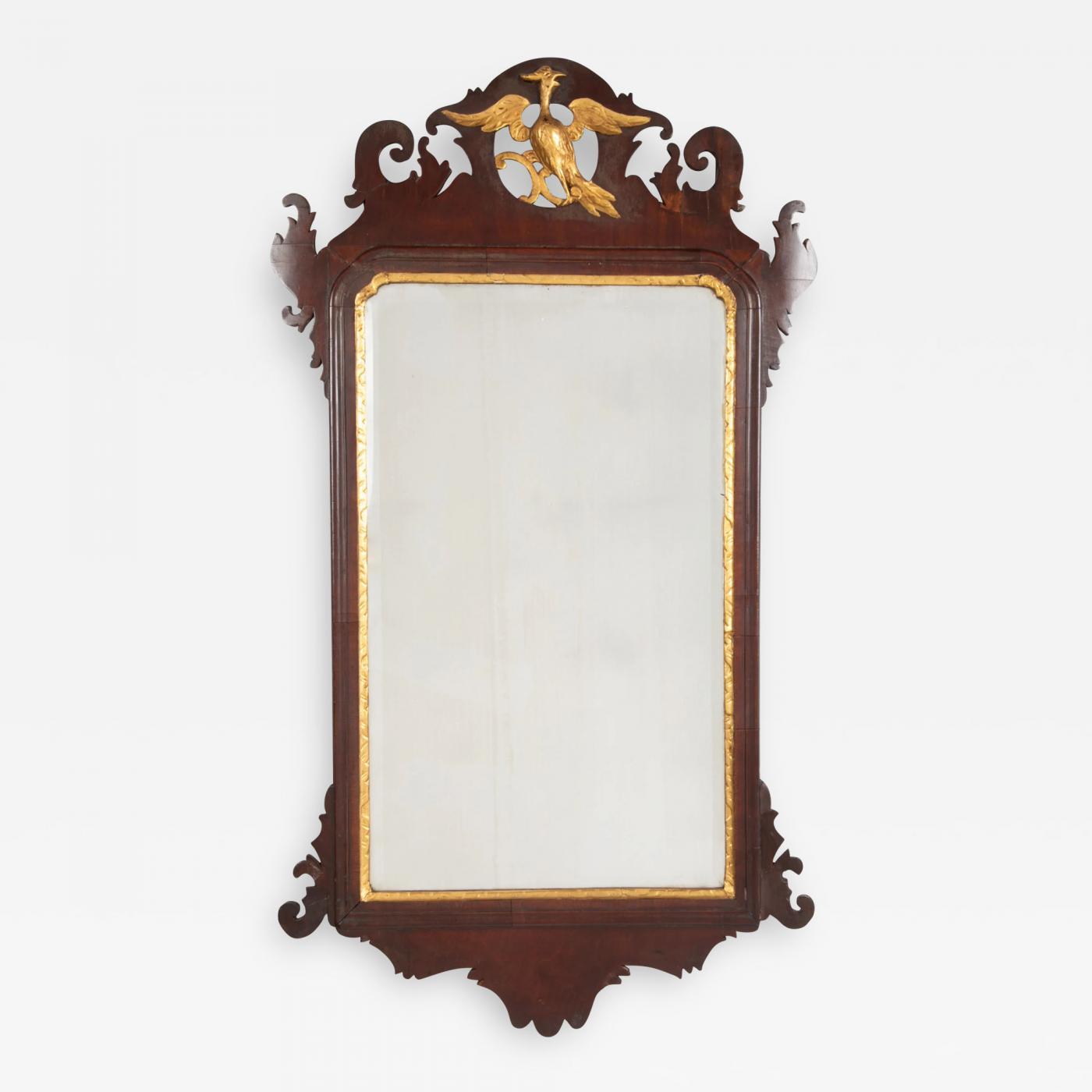 An 18th Century English Chippendale Carved Mahogany Mirror with Gilt Phoenix An 18th Century English Chippendale Carved Mahogany Mirror with Gilt Phoenix