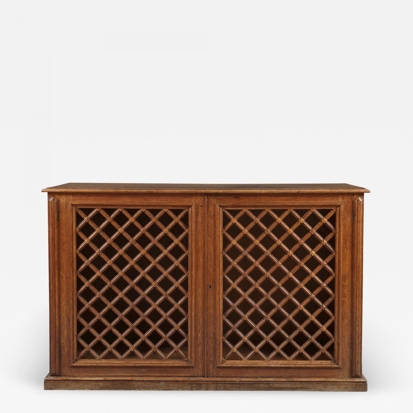 An Oak Two Door Library Cabinet With Unusual Original Lattice