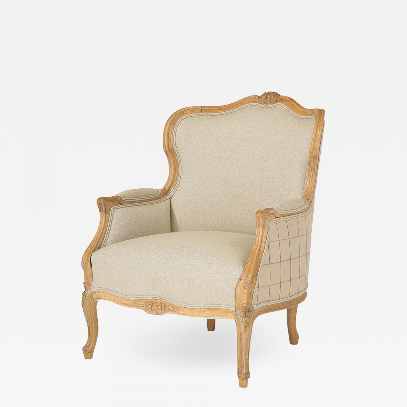 A nineteenth century, French upholstered Louis XV style bergere chair.