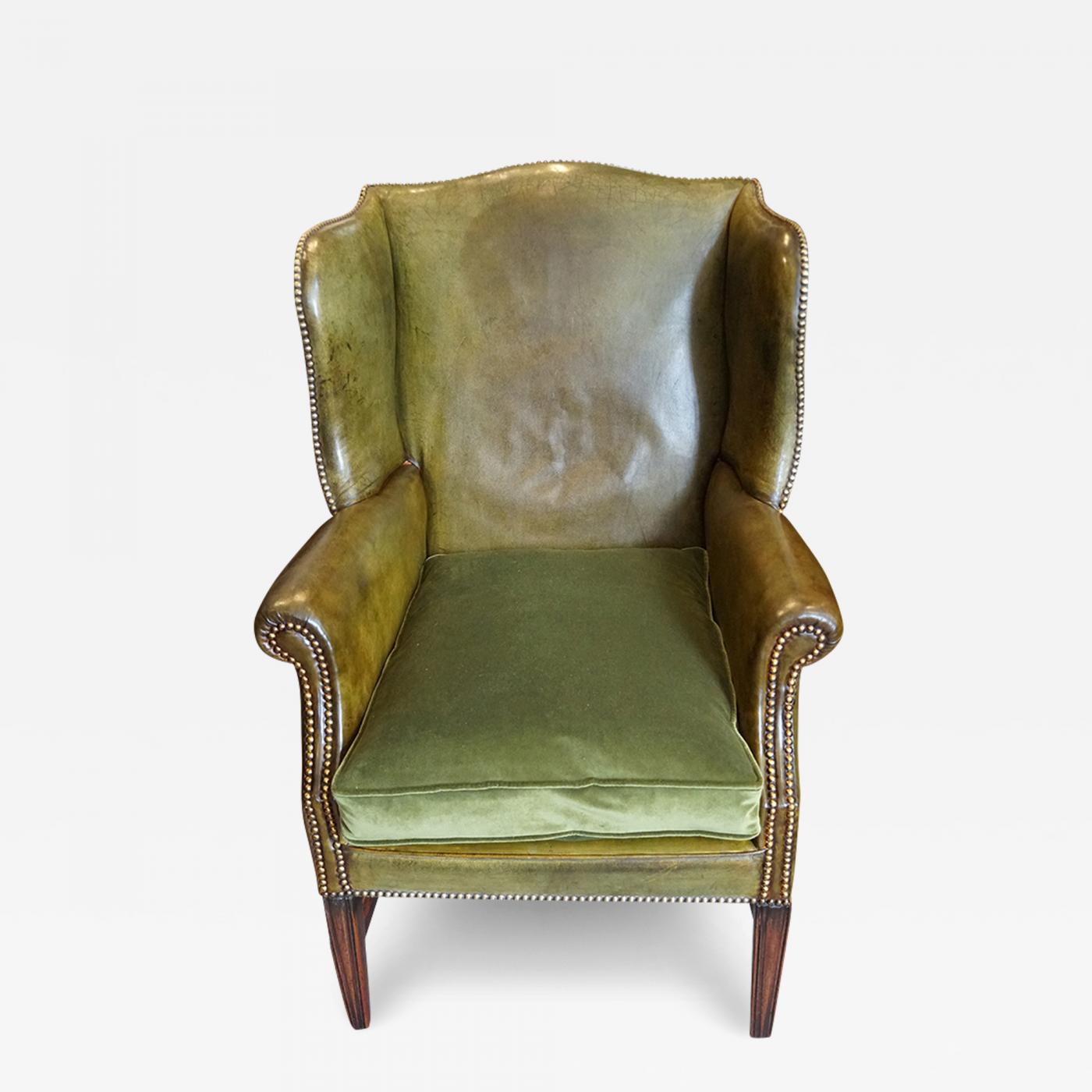 green leather wingback chairs