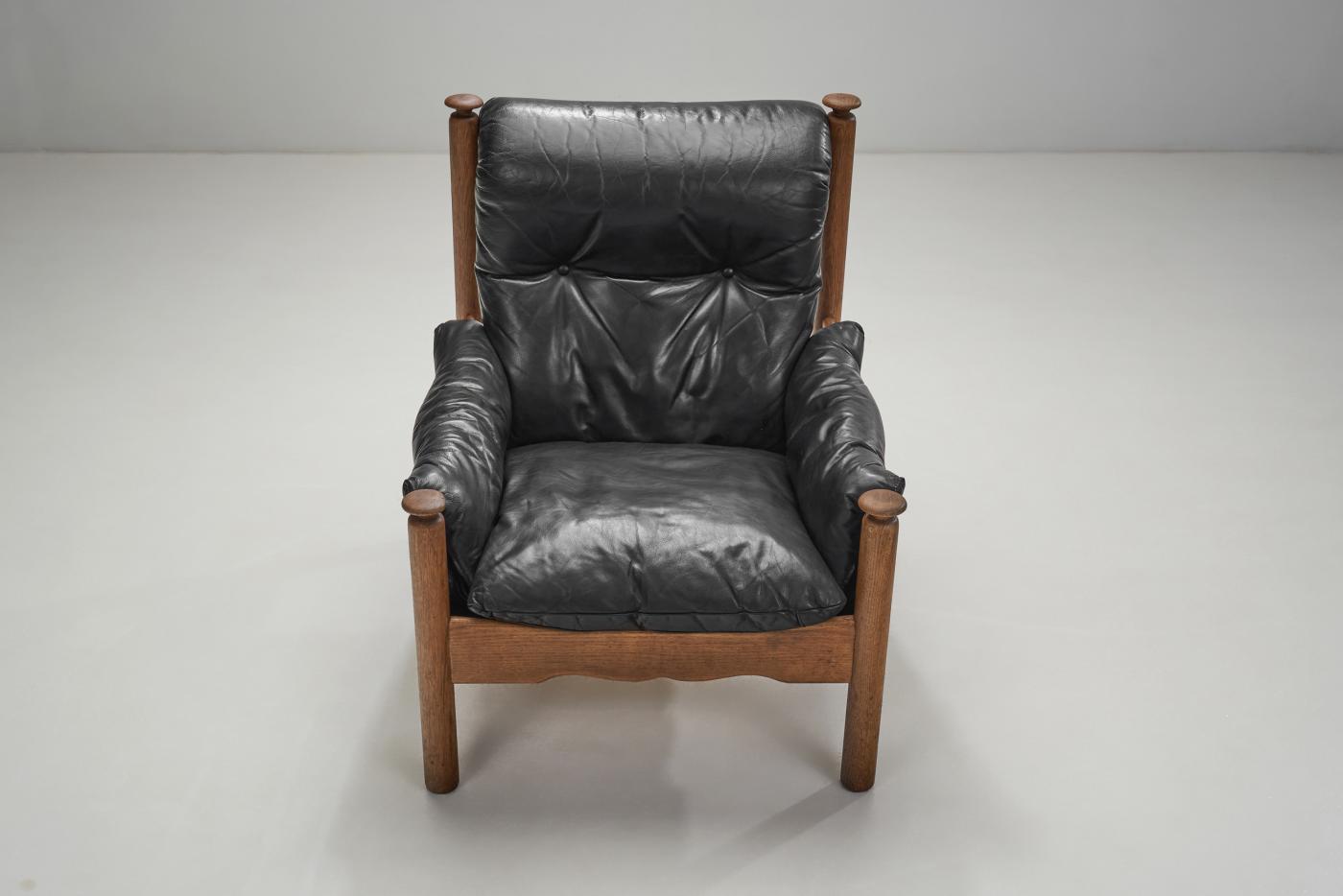 European Black Leather and Wood Lounge Chair, Europe ca 1950s