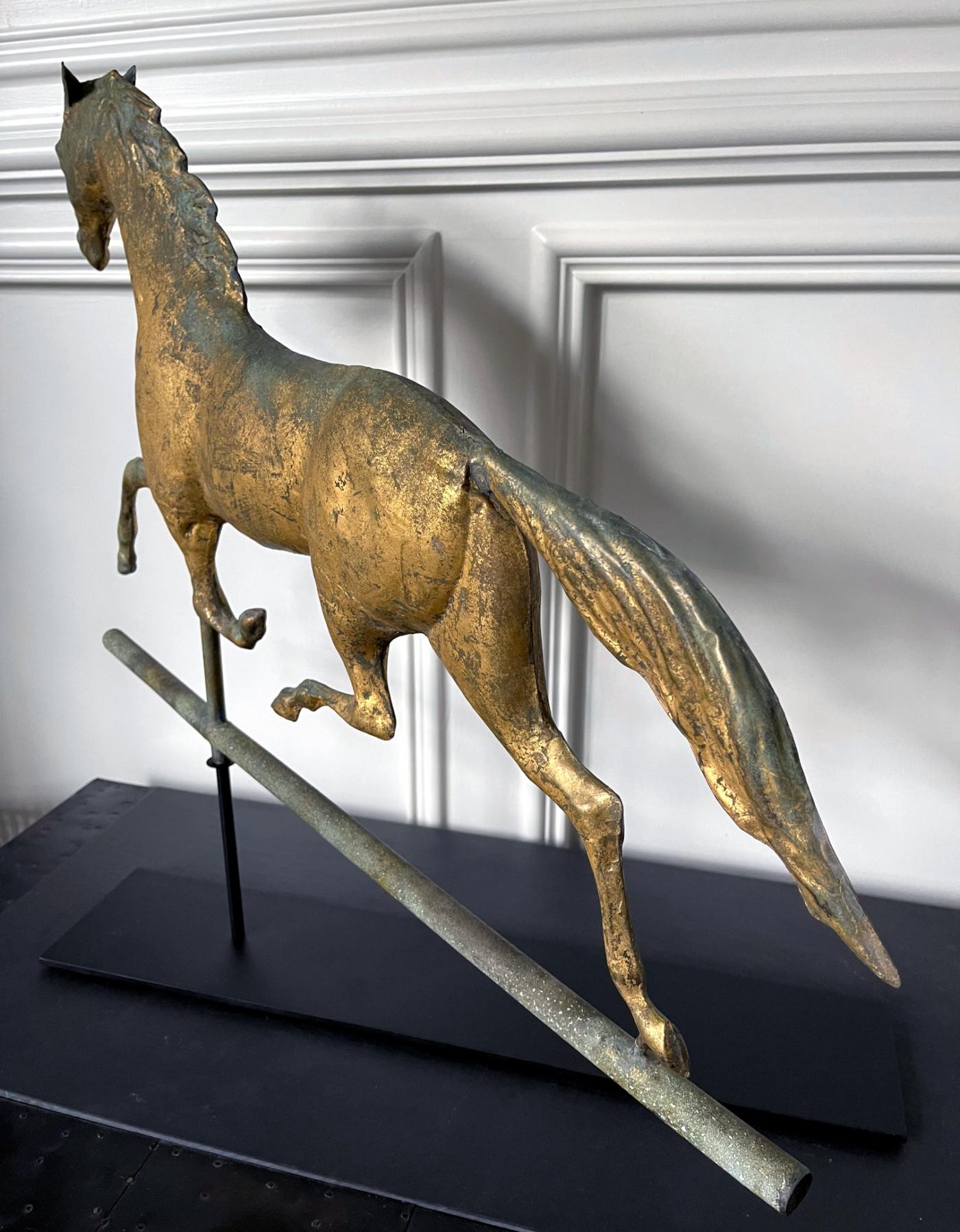 Weathervane Display J. W. Fiske & Company - Horse Weathervane with Gilt Surface on Display ...