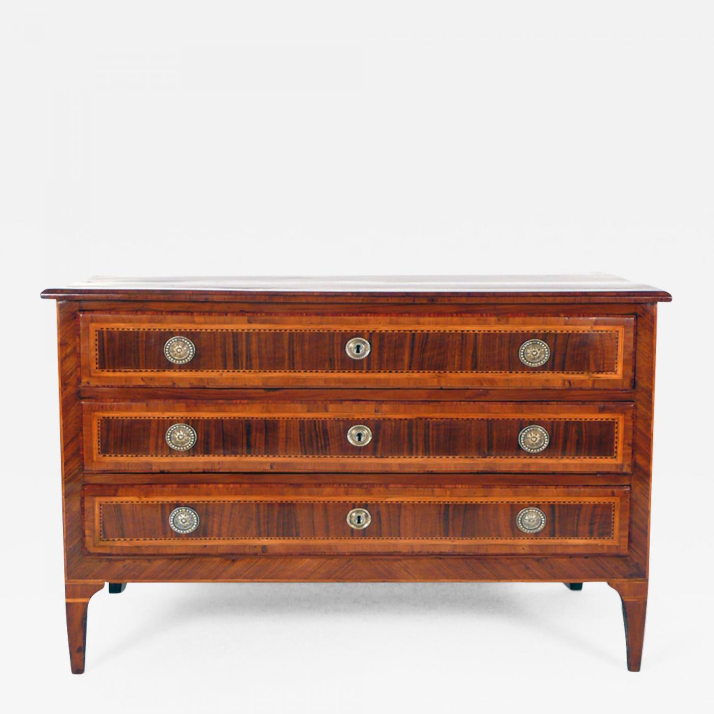 Italian Louis XVI chest of drawers with various woods inlays.