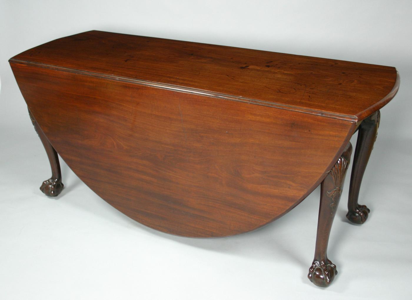 Mahogany drop leaf dining table.