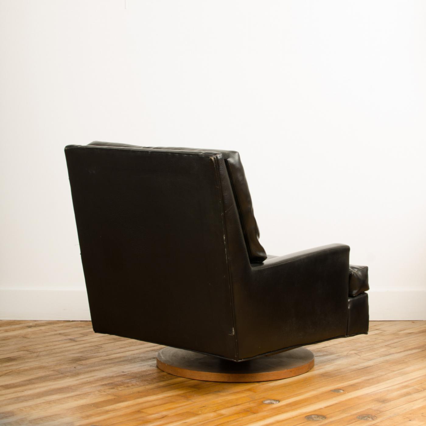 Mid Century Modern Black Leather Reclining Chair and Ottoman by Milo Baughman.
