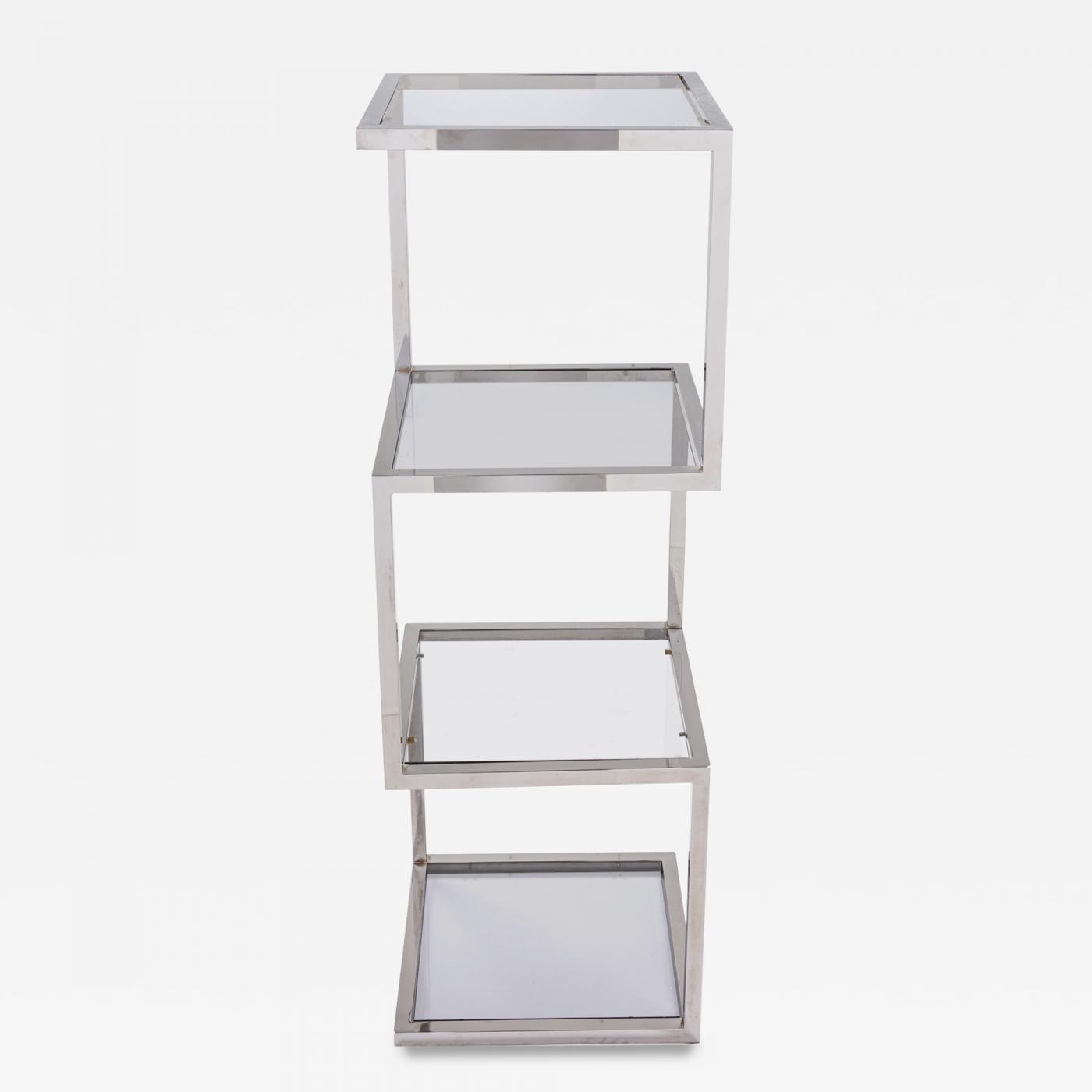 FLAT BAR CHROME AND GLASS ETAGERE IN THE MANNER OF MILO BAUGHMAN