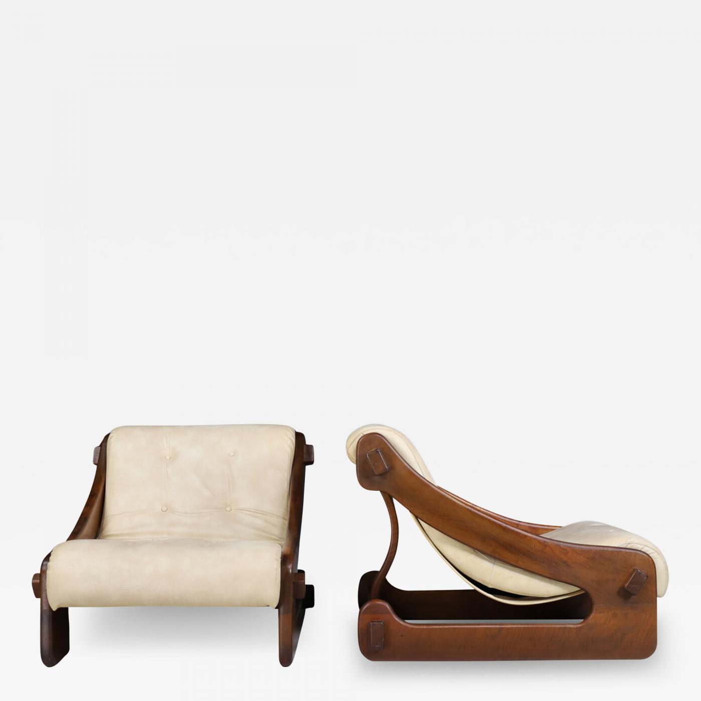 Pair French 1970s low slung brutalist lounge chairs