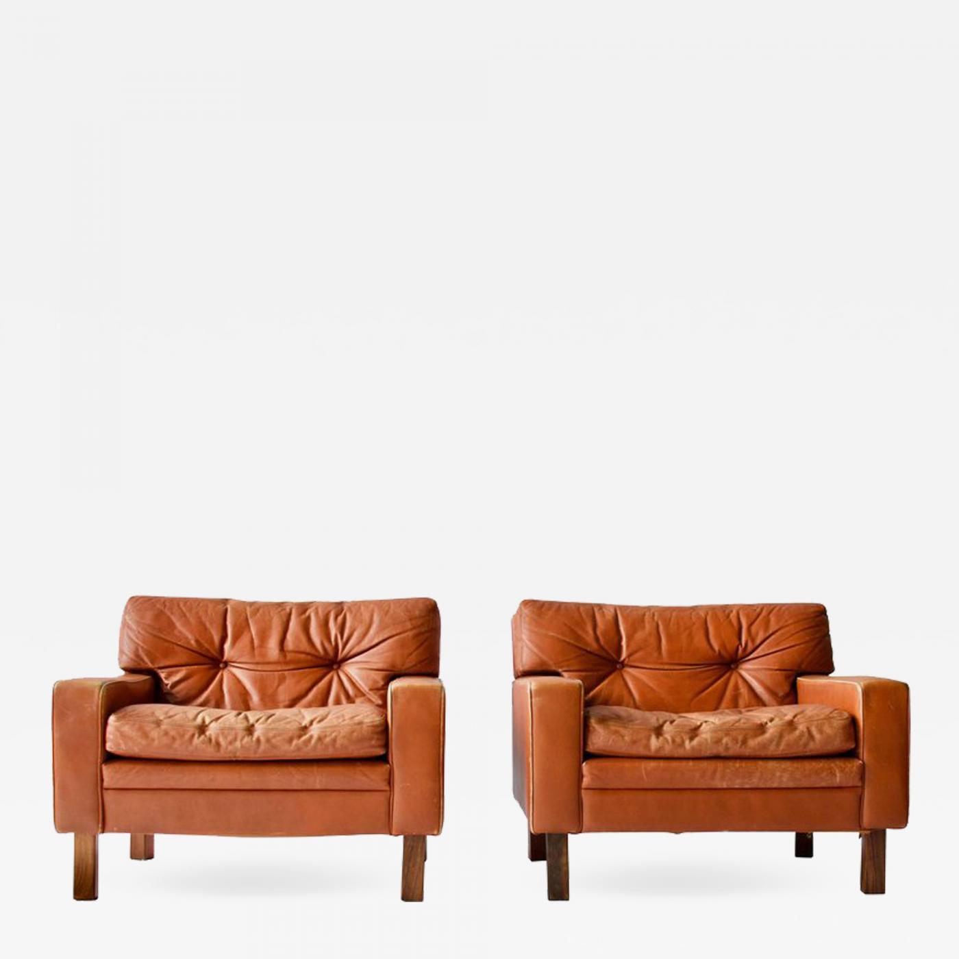 Pair Of Low And Wide Danish Leather Lounge Chairs