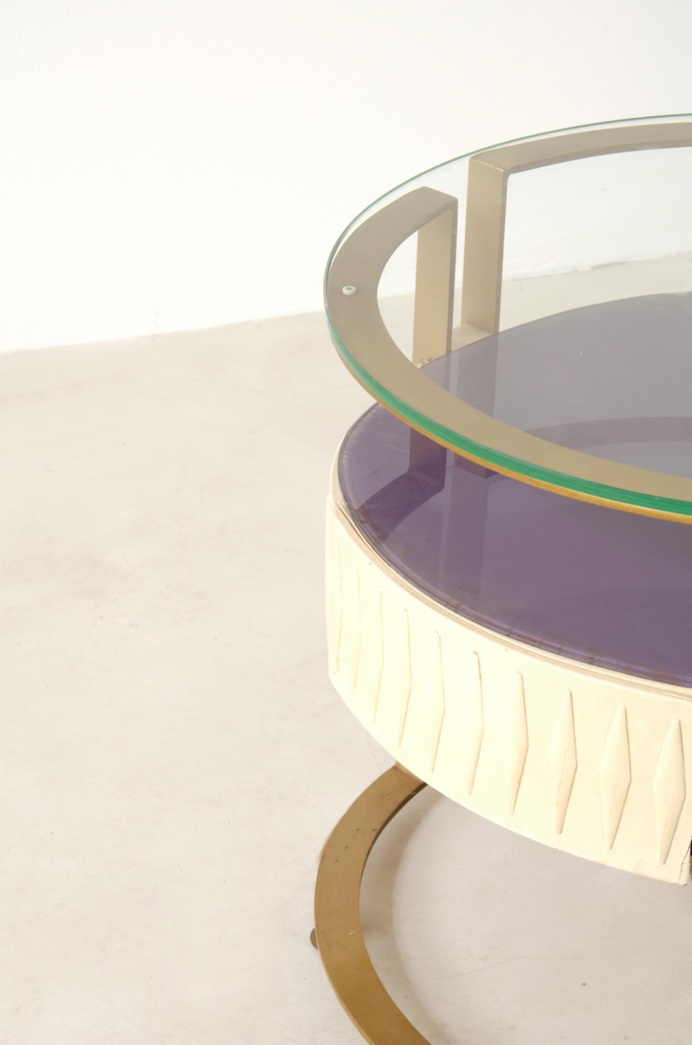 Pair of unique ovalshaped bedside tables with metal