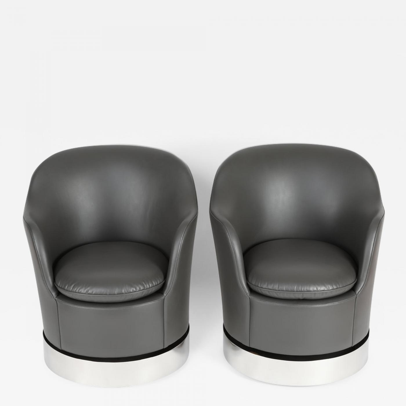philip enfield  pair of philip enfield tilt and swivel barrel chairs on  casters