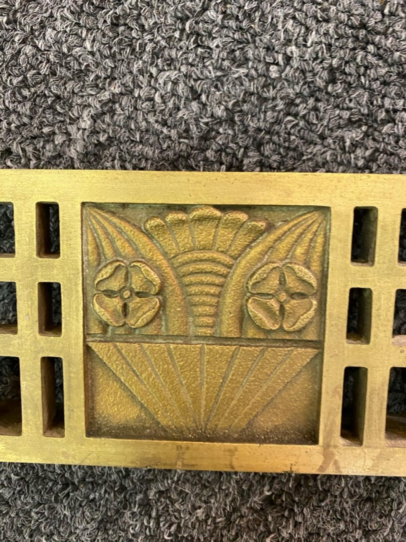 THREE BRONZE ART DECO ARCHITECTURAL RADIATOR COVERS