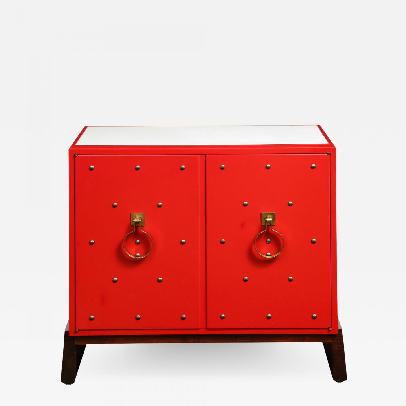 A Tommi Parzinger cabinet with 3 interior drawers A Tommi Parzinger cabinet with 3 interior drawers